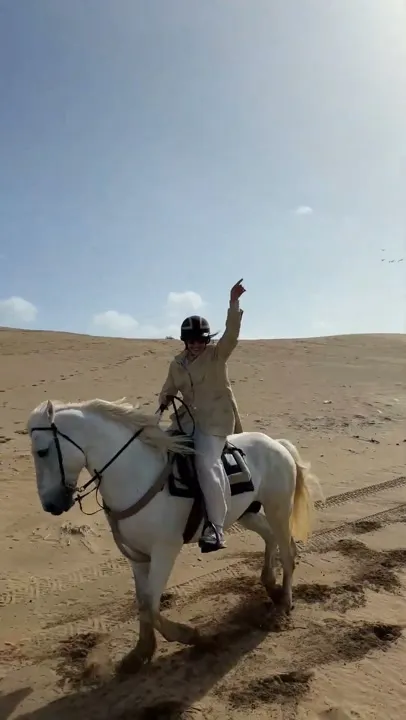 Horse riding on the dunes
